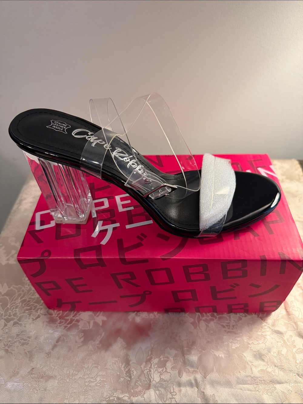 Cape Robbin clear with black soles heels
